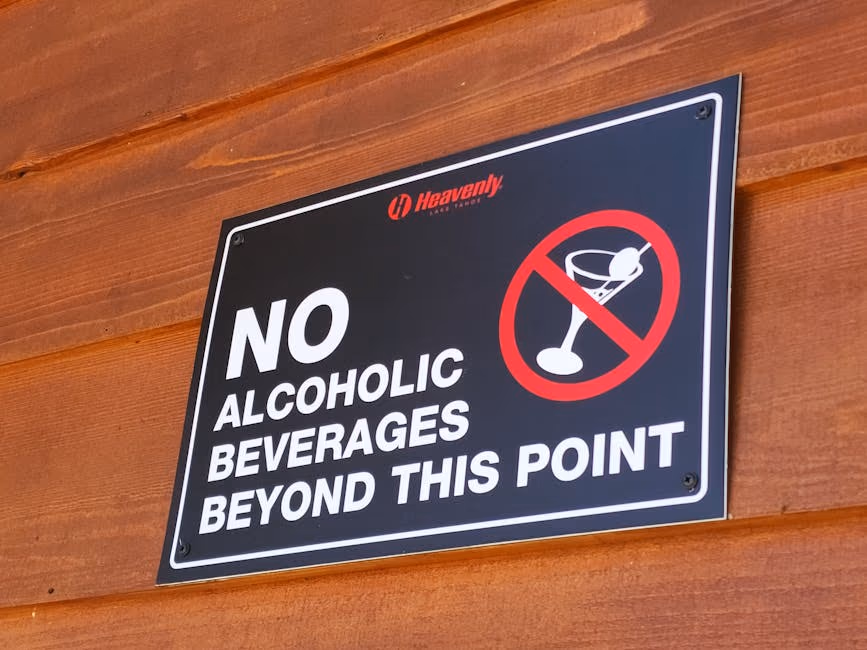 A warning sign prohibiting alcoholic beverages beyond this point at Heavenly Lake Tahoe.